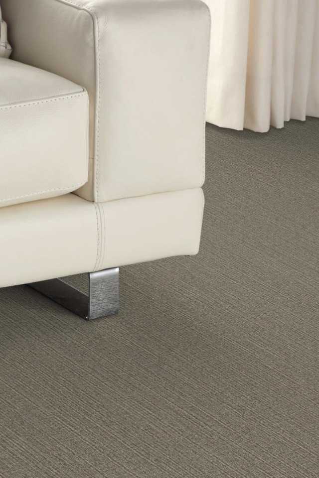 close up of grey wool carpet in modern white living room